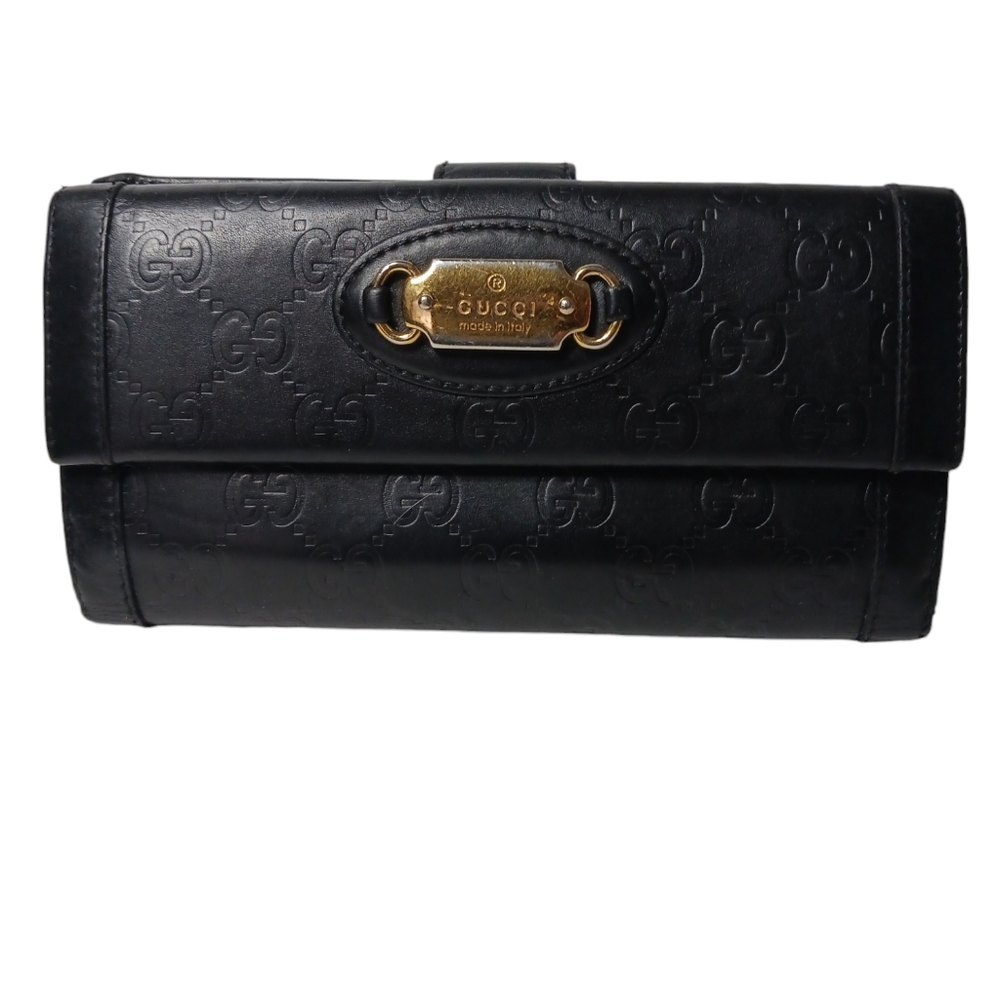 GUCCI Guccissima punch continental flap wallet black leather gold tone plate.